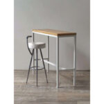 Barra desayunadora en madera petiribí o paraíso con estructura de hierro diseño minimalista.