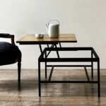 Mesa baja o ratona elevable en madera petiribí o paraíso con patas de hierro de diseño escandinavo industrial minimalista