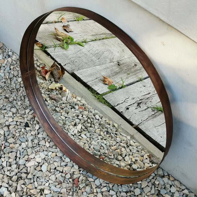 Espejo redondo Siena Oxido para decoración de exteriores y jardines.